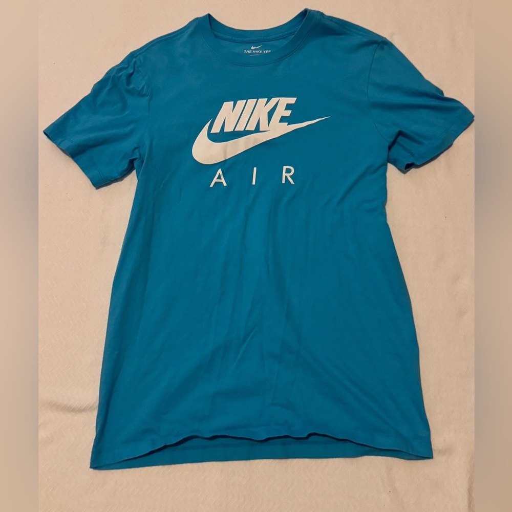 Teal Nike shirt